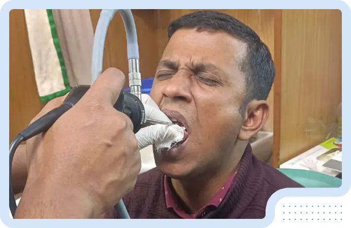 Doctor explaining the causes and symptoms of adeno-tonsillitis